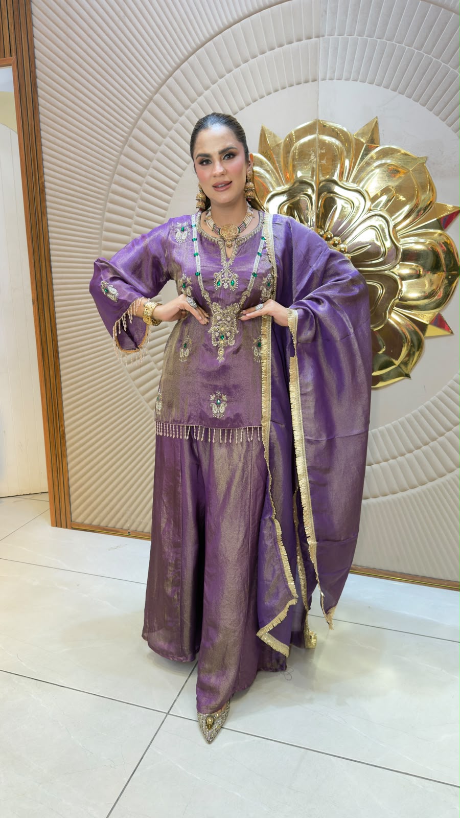 Elegant purple ethnic ensemble consisting of an embroidered kurta, matching palazzo pants, and a dupatta pc3325