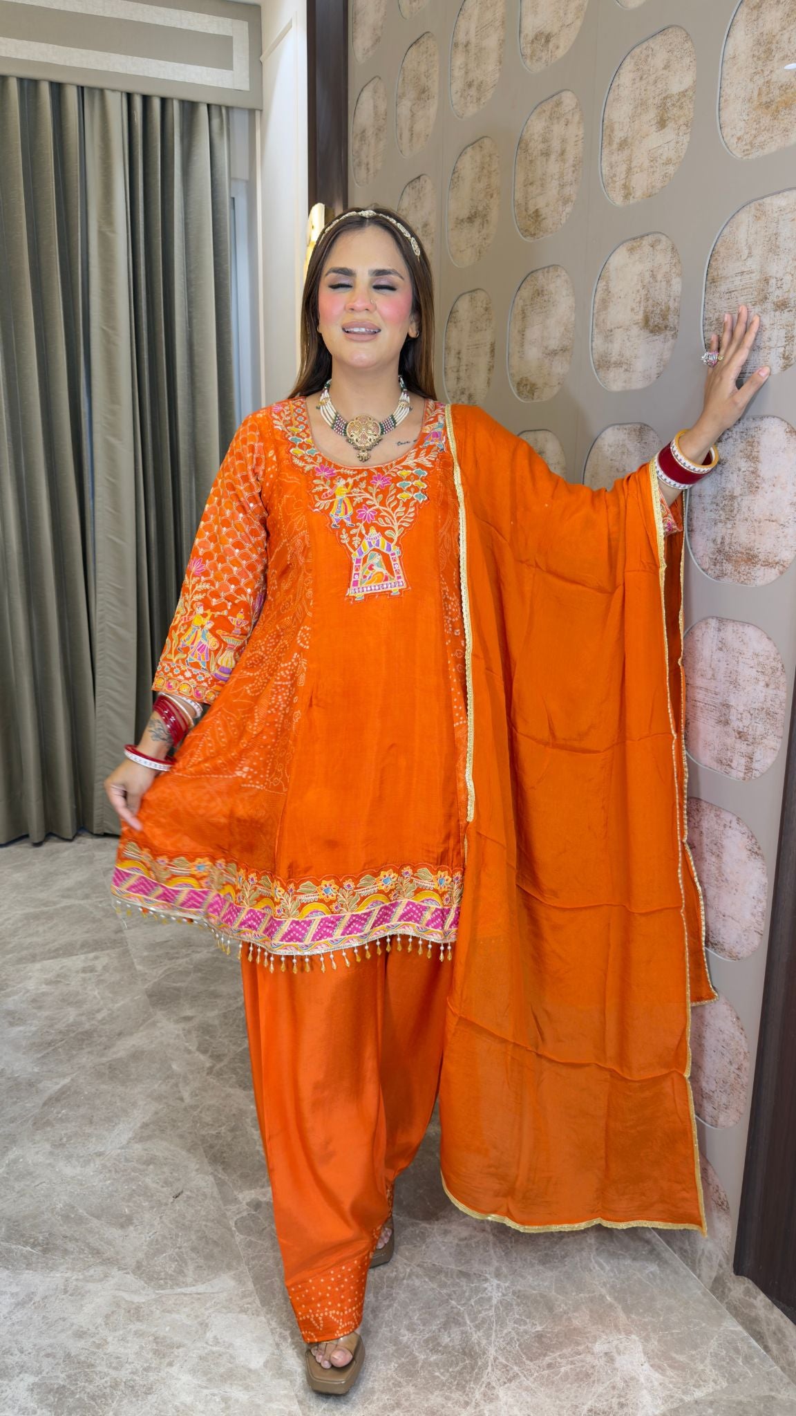 Elegant ethnic ensemble featuring a short embroidered kurta paired with a matching salwar and dupatta  pc3382