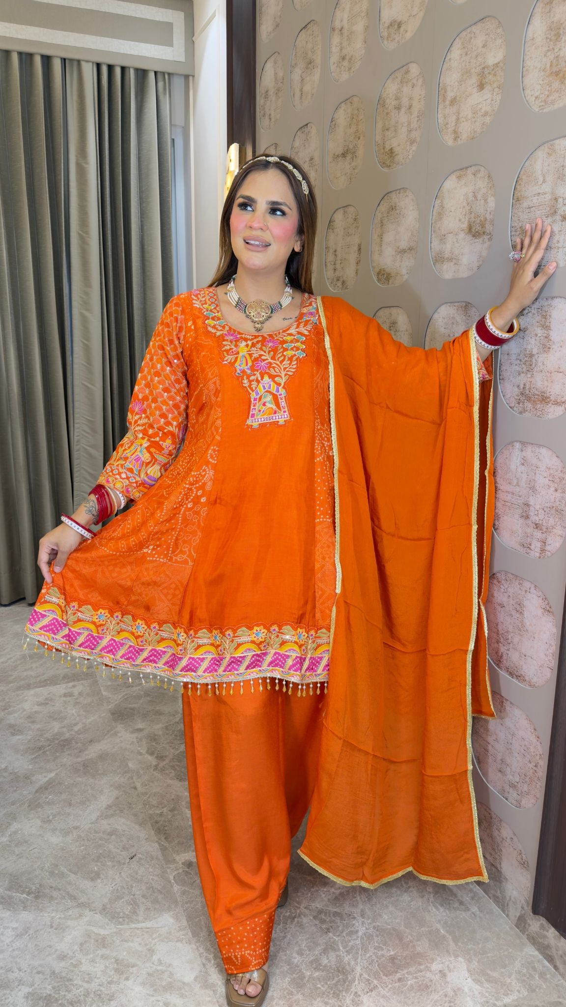 Elegant ethnic ensemble featuring a short embroidered kurta paired with a matching salwar and dupatta  pc3382