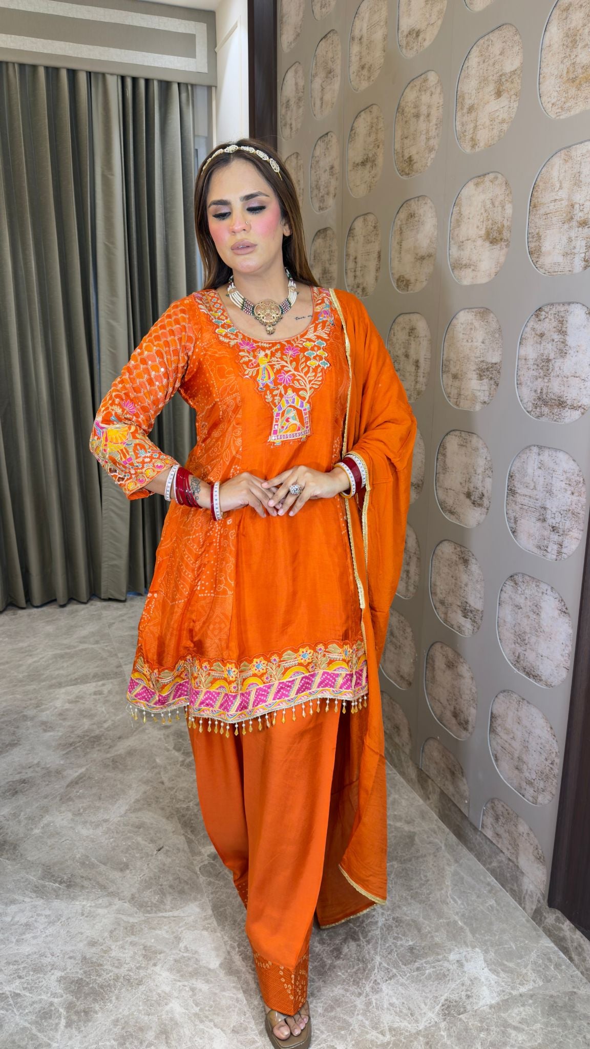 Elegant ethnic ensemble featuring a short embroidered kurta paired with a matching salwar and dupatta  pc3382