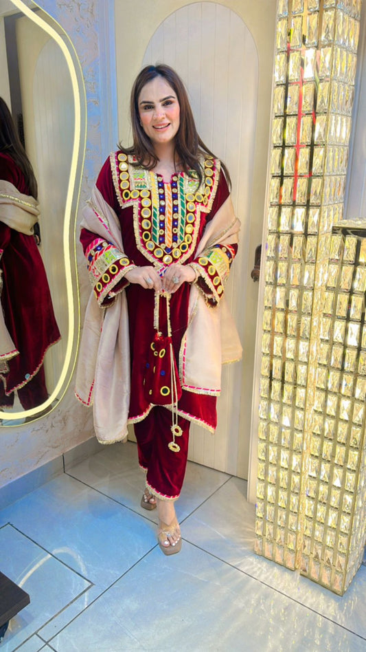 Beautiful Velvet Suit With Heavy Mirror Work And Potli PC233