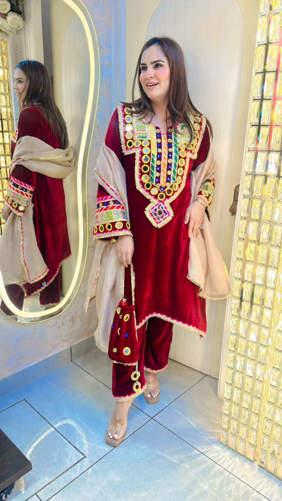 Beautiful Velvet Suit With Heavy Mirror Work And Potli PC233