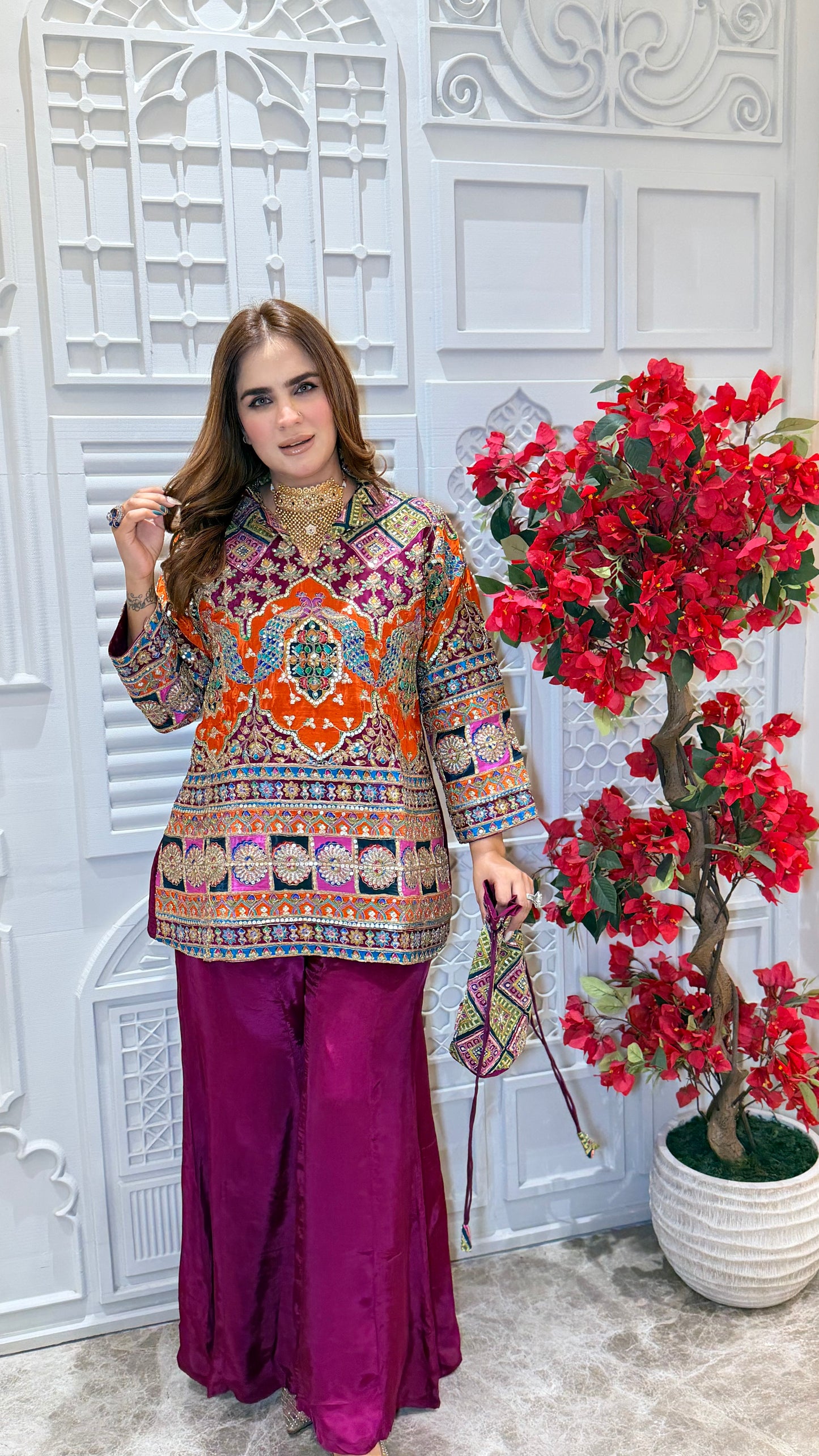 Elegant two-piece kurta set with matching red sharara pants. PC3385