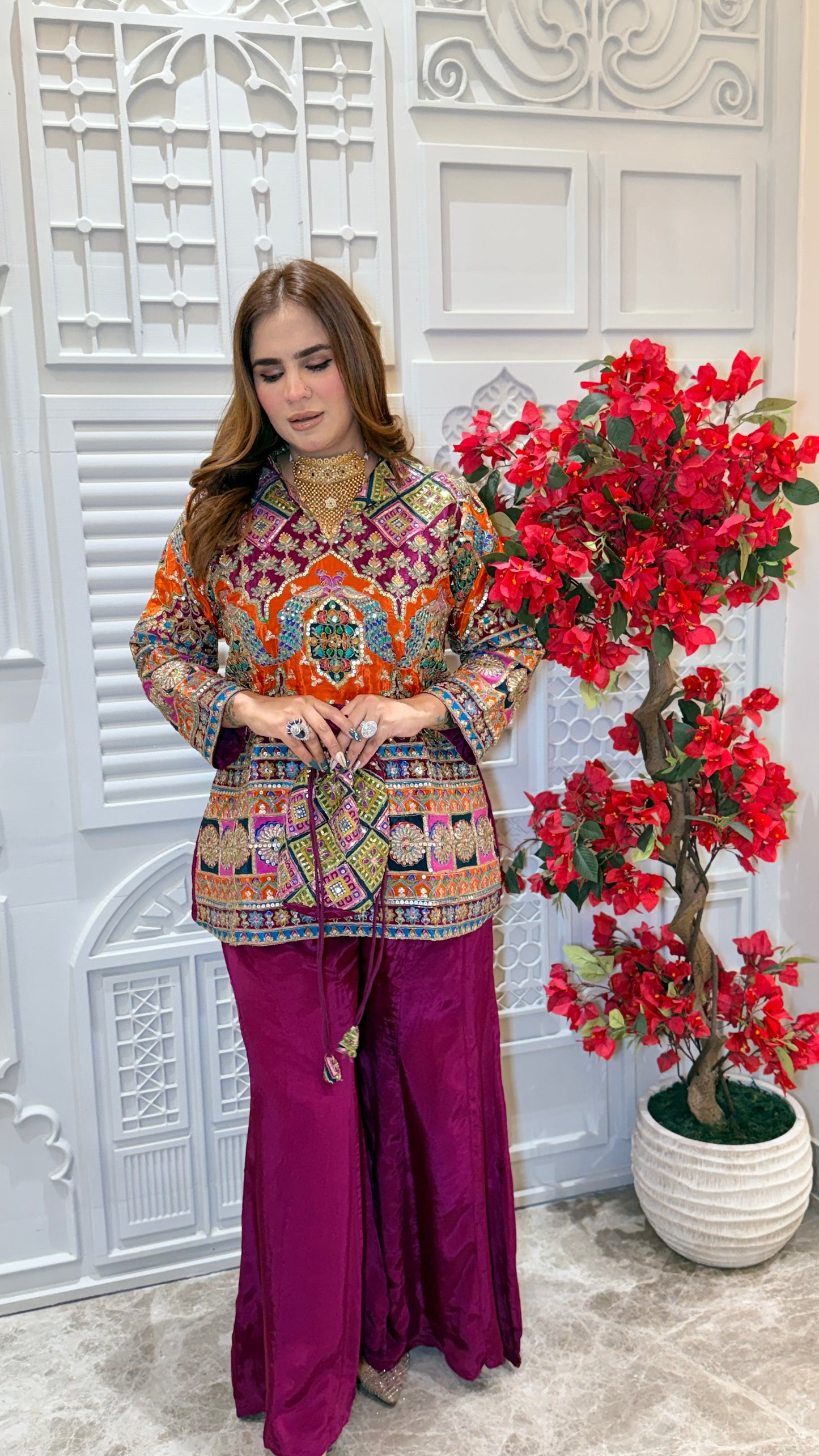 Elegant two-piece kurta set with matching red sharara pants. PC3385