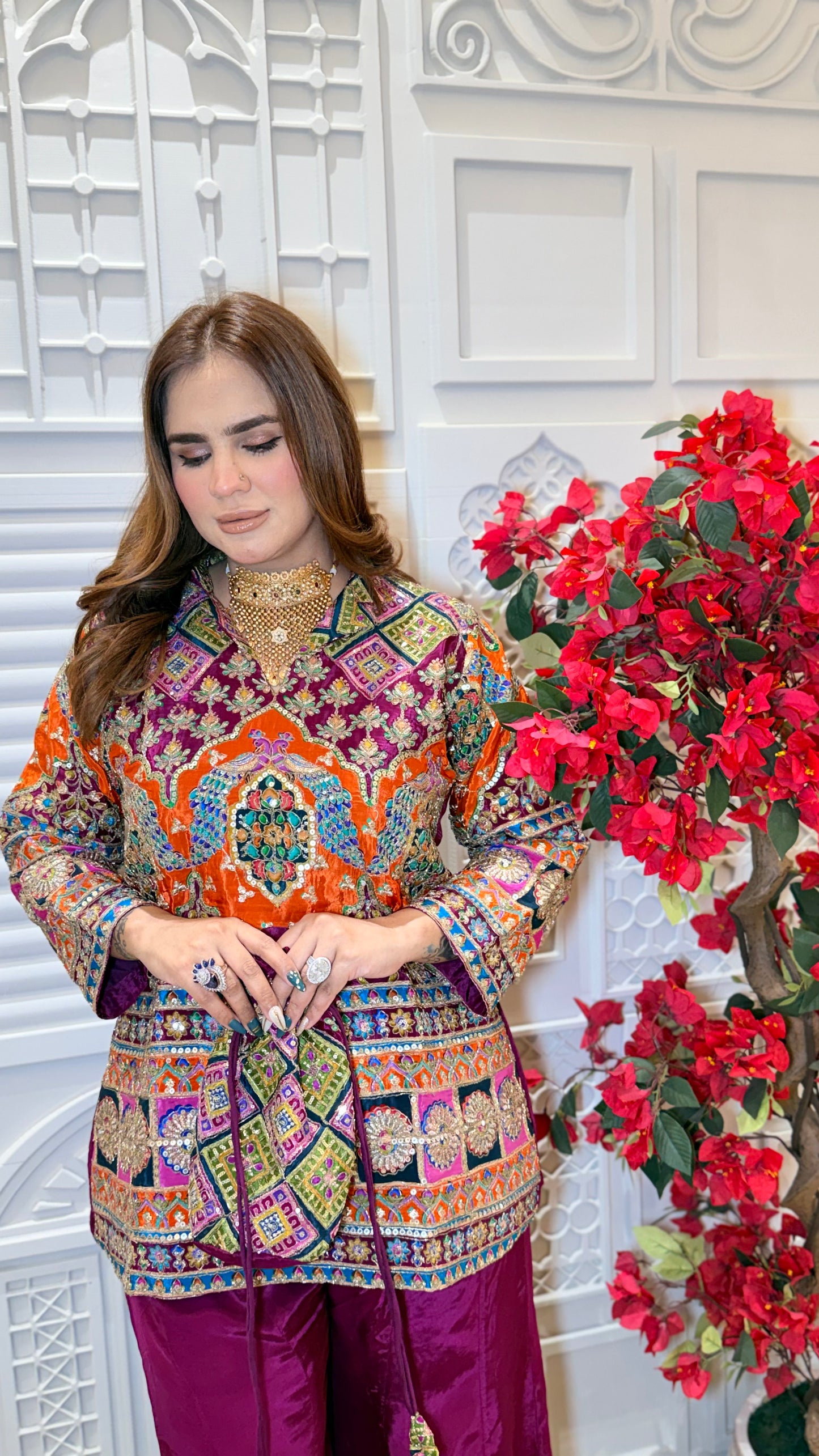 Elegant two-piece kurta set with matching red sharara pants. PC3385