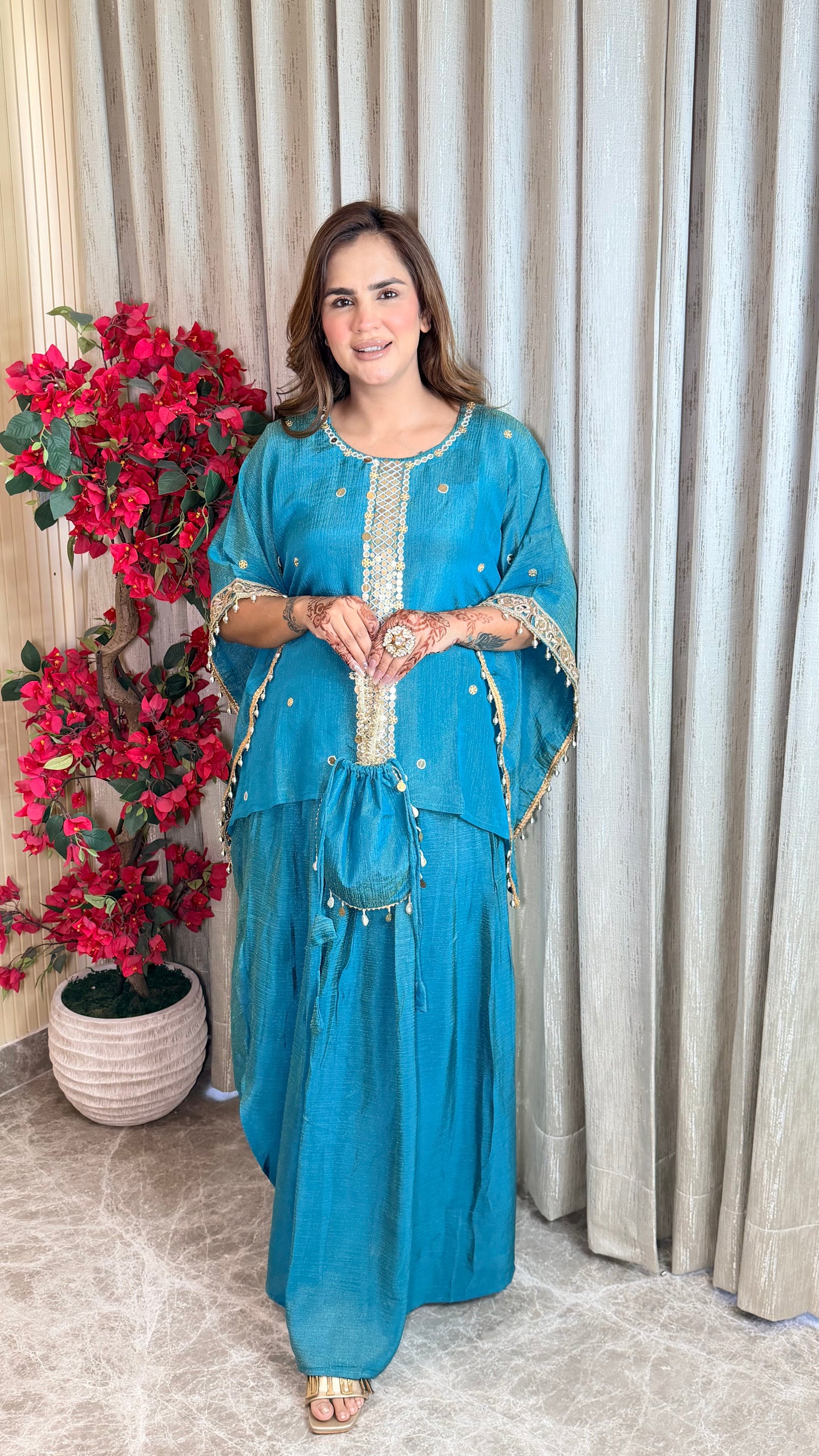 Beautiful mirror-work kaftan top paired with a matching long skirt  PC3526