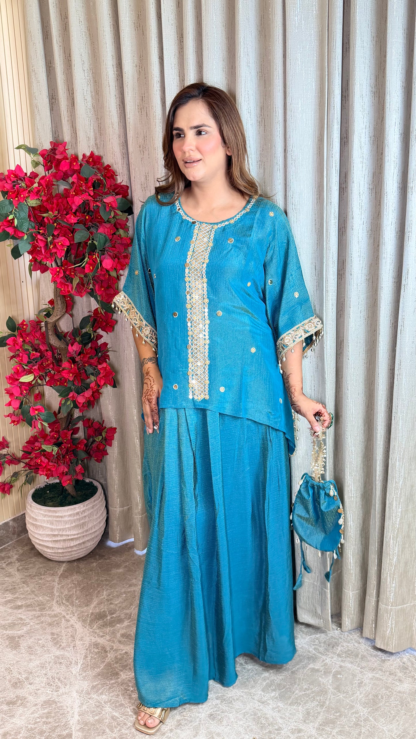 Beautiful mirror-work kaftan top paired with a matching long skirt  PC3526