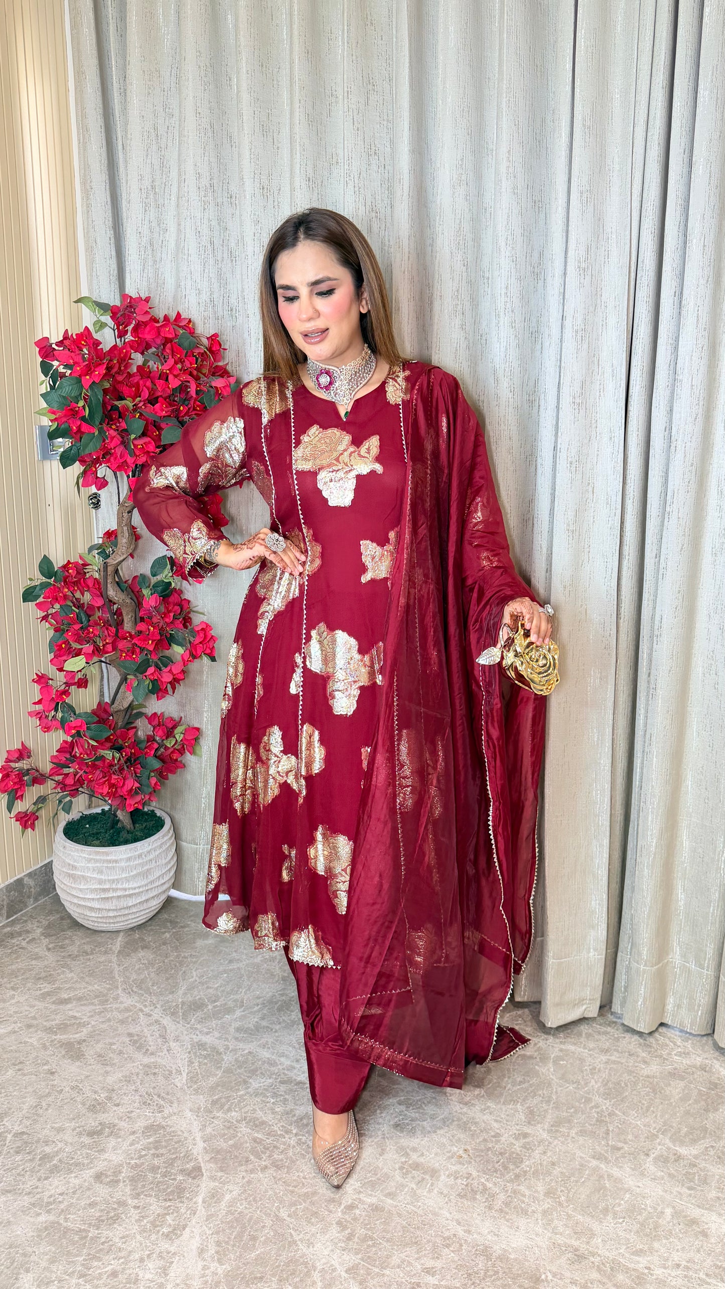 Beautiful foil-printed kurta set with matching trousers and a draped dupatta. PC3535
