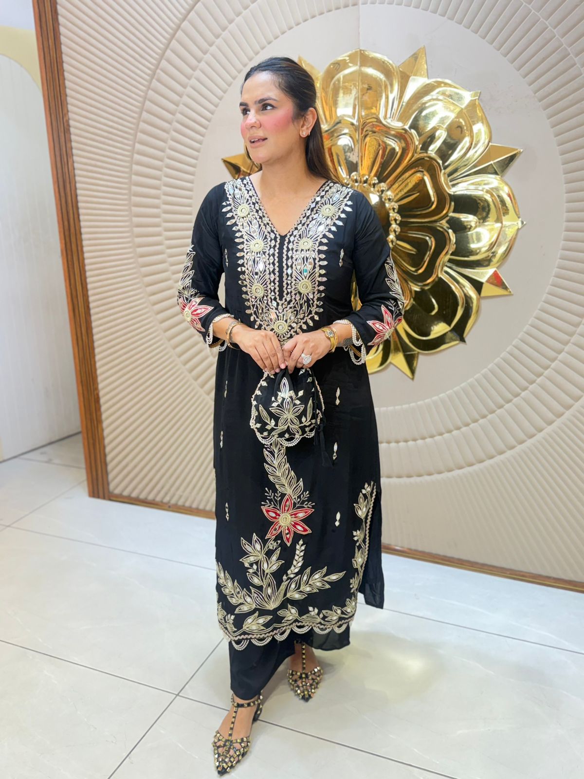 Beautiful Embroidery Work Suit With Potli PC3101