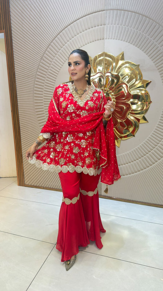 Beautiful red embroidered peplum sharara suit set pc3330