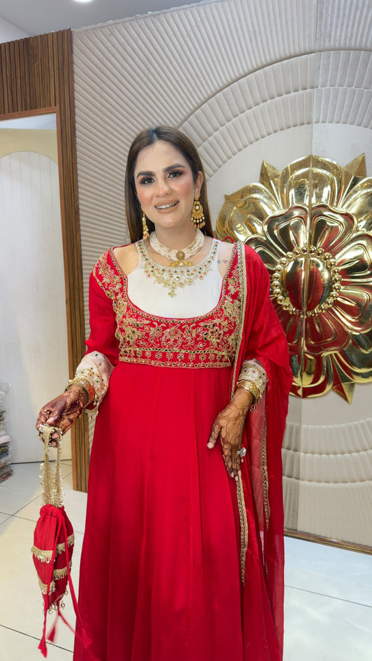 Elegant embroidered Anarkali suit paired with a matching dupatta and festive embellishments PC3359