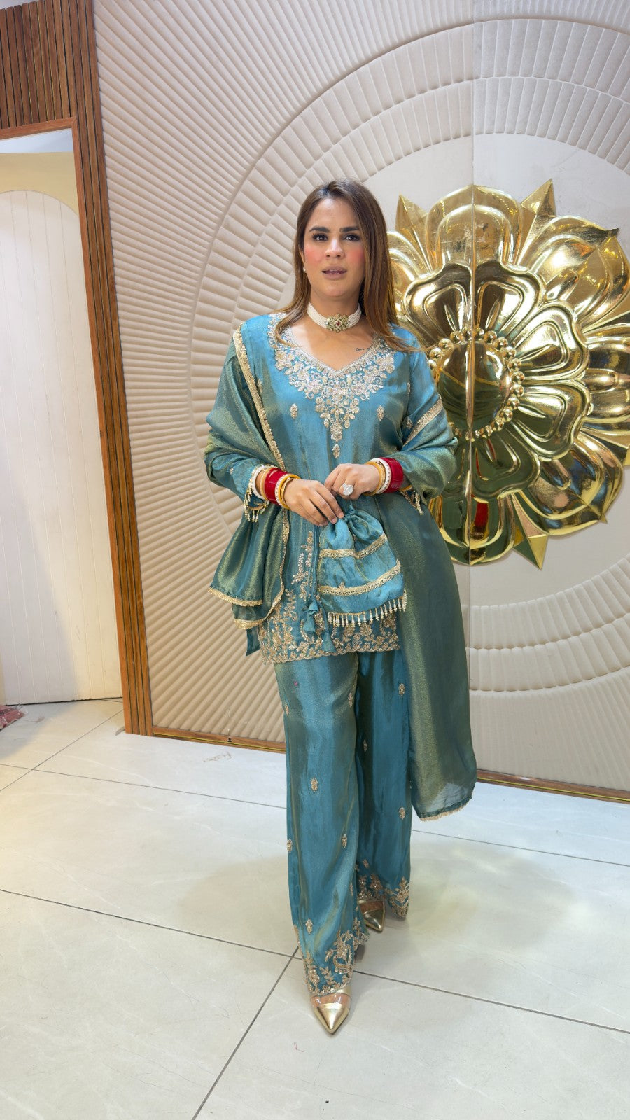 Beutiful elegant partywear suit with potli pc3818