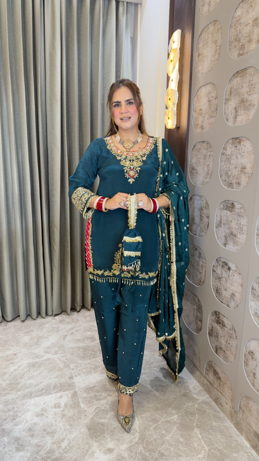 Beutiful elegant partywear suit with potli pc3356